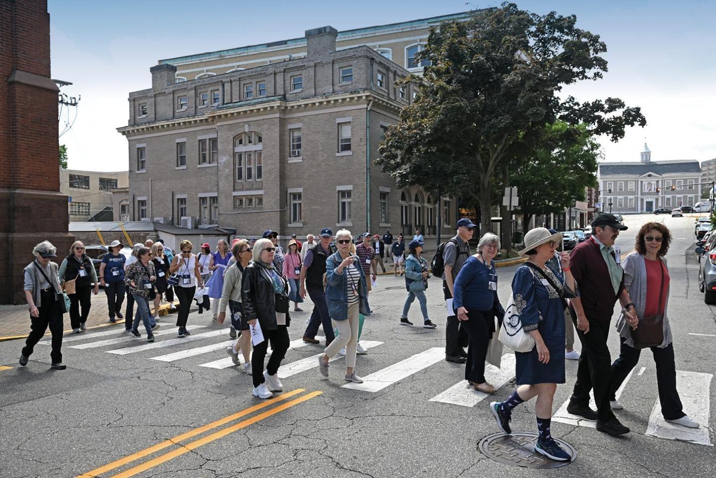 Alumni walking in New London at Reunion 2024