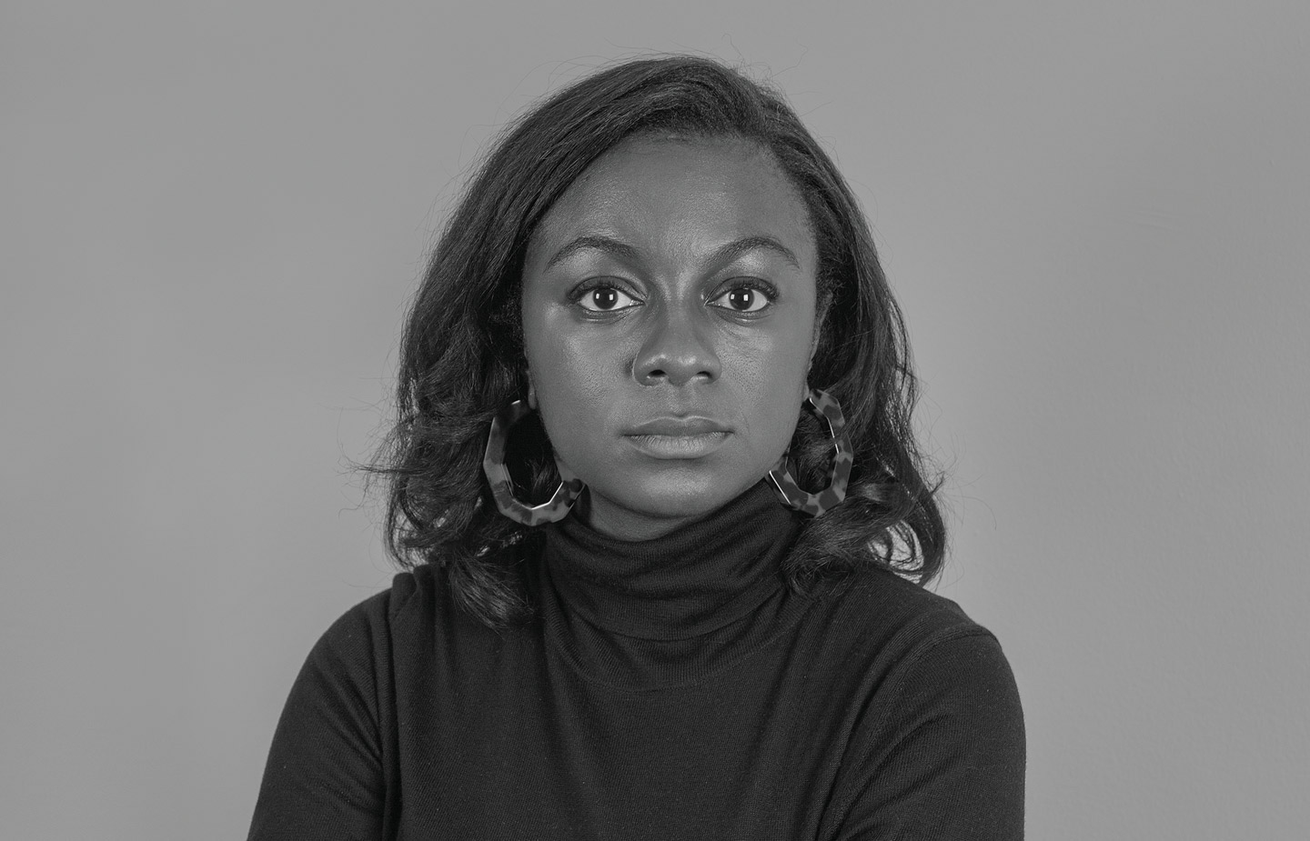 Black and white portrait of Jazmine Hughes ’12