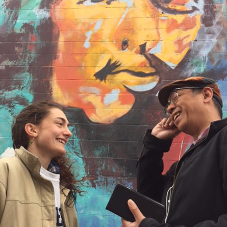 Virginia Gresham '17 with New London artist Jonas Sanchez in front of his 