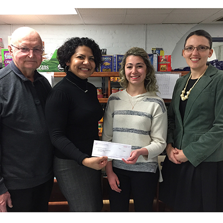 From left: New London Area Food Coalition Treasurer Bob Lavoie, Chelsea Groton's Christina Nocito, Sarah Harris '18 and Assistant Professor of Anthropology Joyce Bennett.