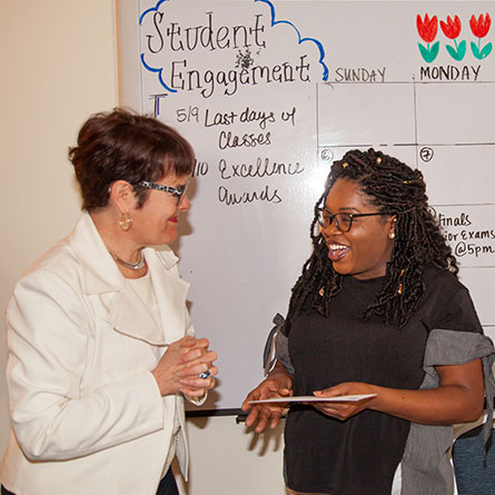 President Katherine Bergeron and Jeannette Williams (Student Support Award), associate director of student engagement and new student programs.
