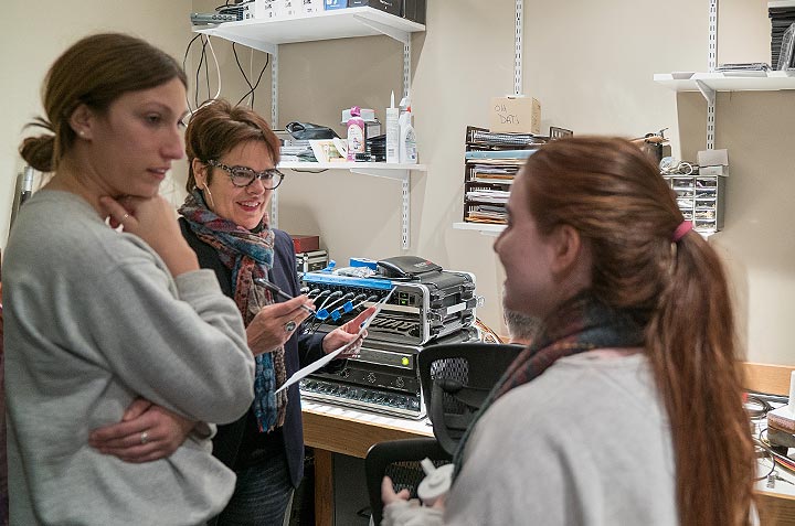 President Bergeron in the mixing room with students