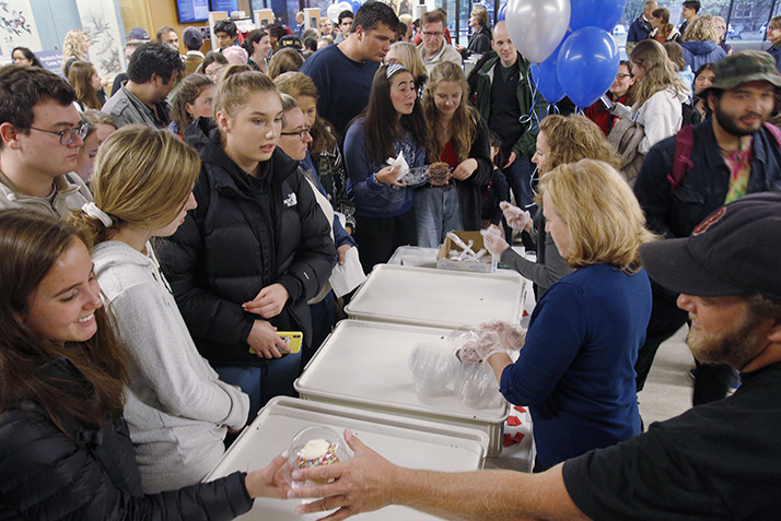 Students enjoy cupcakes at the event