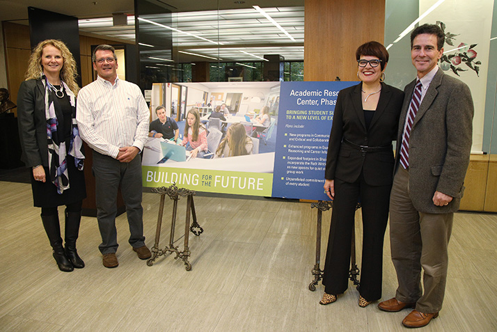 VP Kim Verstandig, Dean Noel Garrett, President Katherine Bergeron and Dean Jefferson Singer pose with an ARC sign.