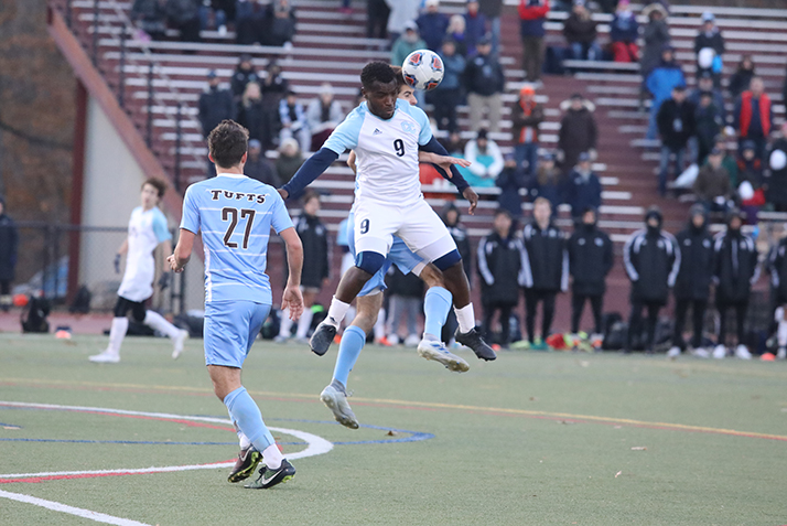 A Conn player wins a header