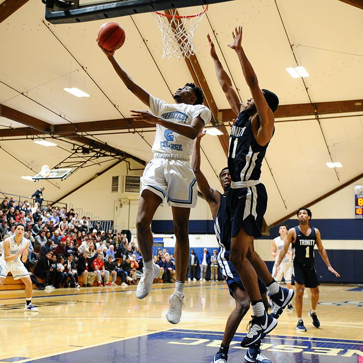 Austin Nwafor ’21 attempts a layup during Saturday’s 50th anniversary contest against Trinity. 