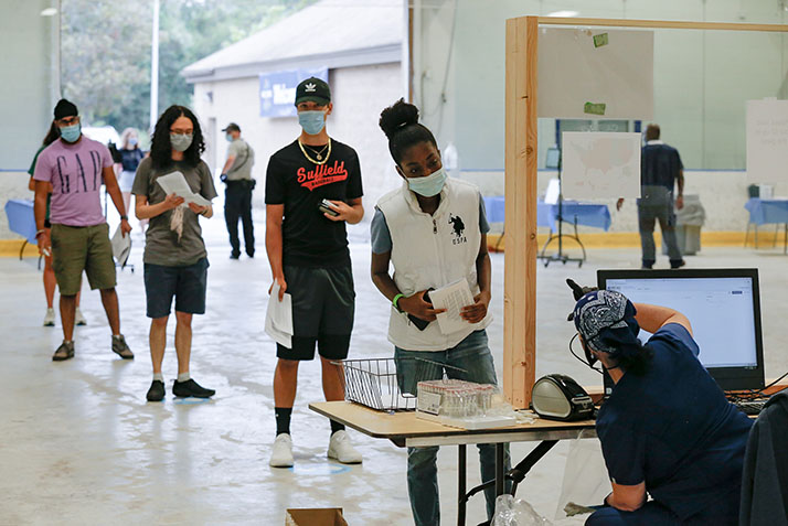 Students wait in line at the testing center