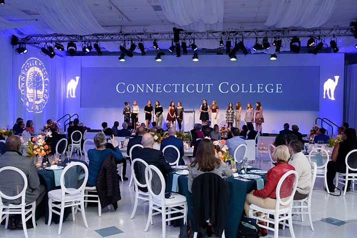 An a cappella group performs for guests. 