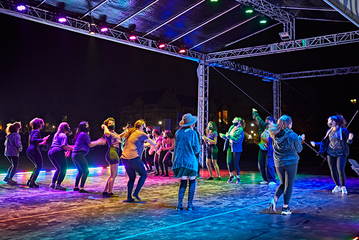 Under the lights on The Dune, students perform a dance number.