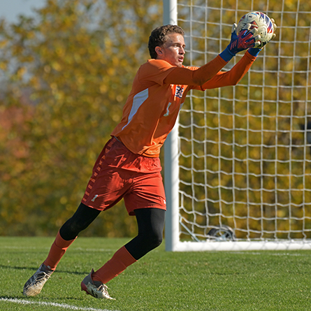 Conn goalie Peter Silvester ’25 makes a save.