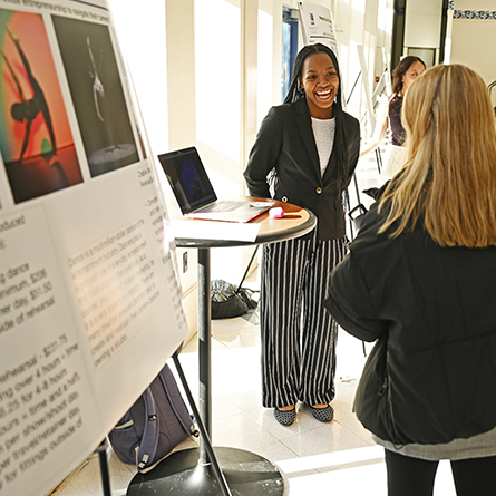 Shawnia Yon '24 presents her poster, 