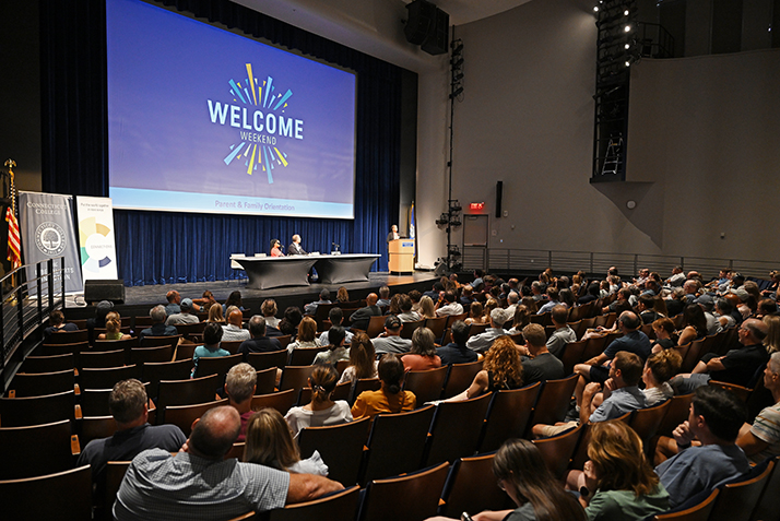 Students and families gather in the Athey Center for an Arrival Day event.