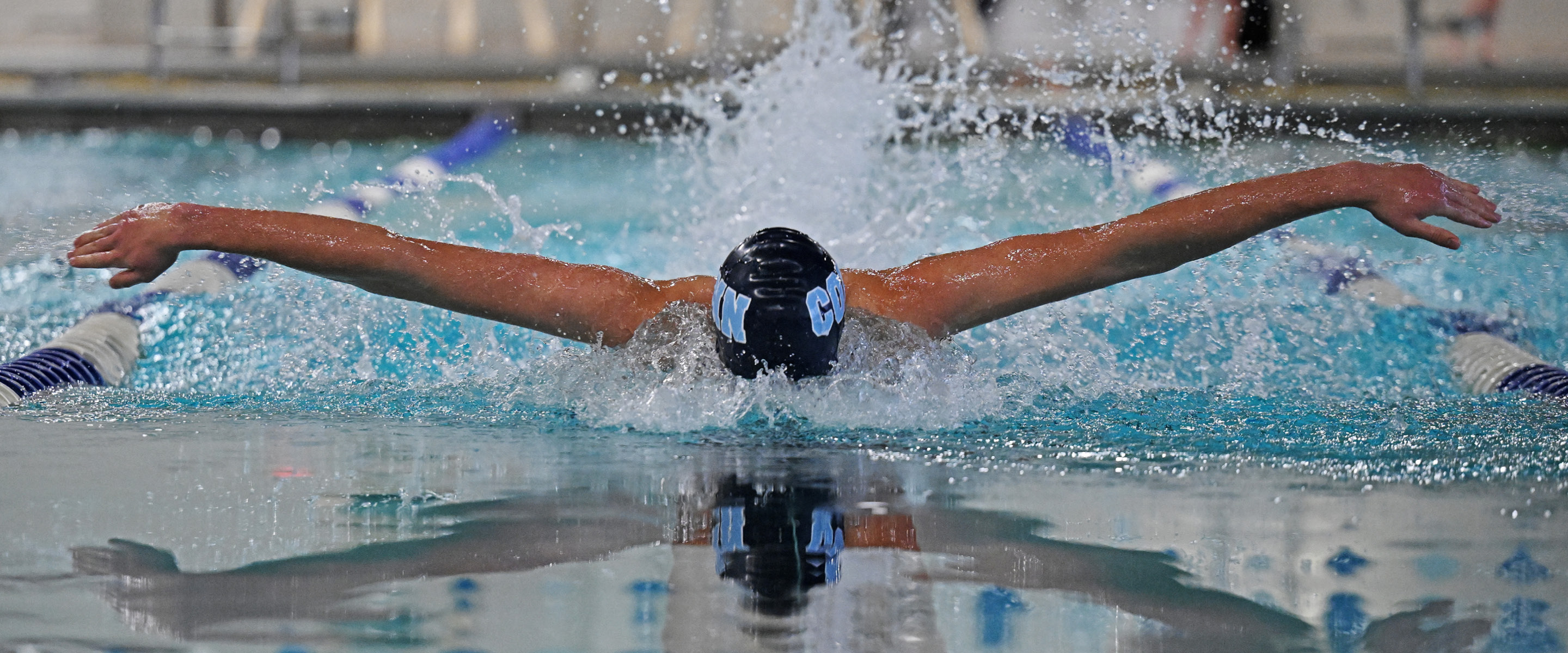 Photo of swimmer splashing in pool