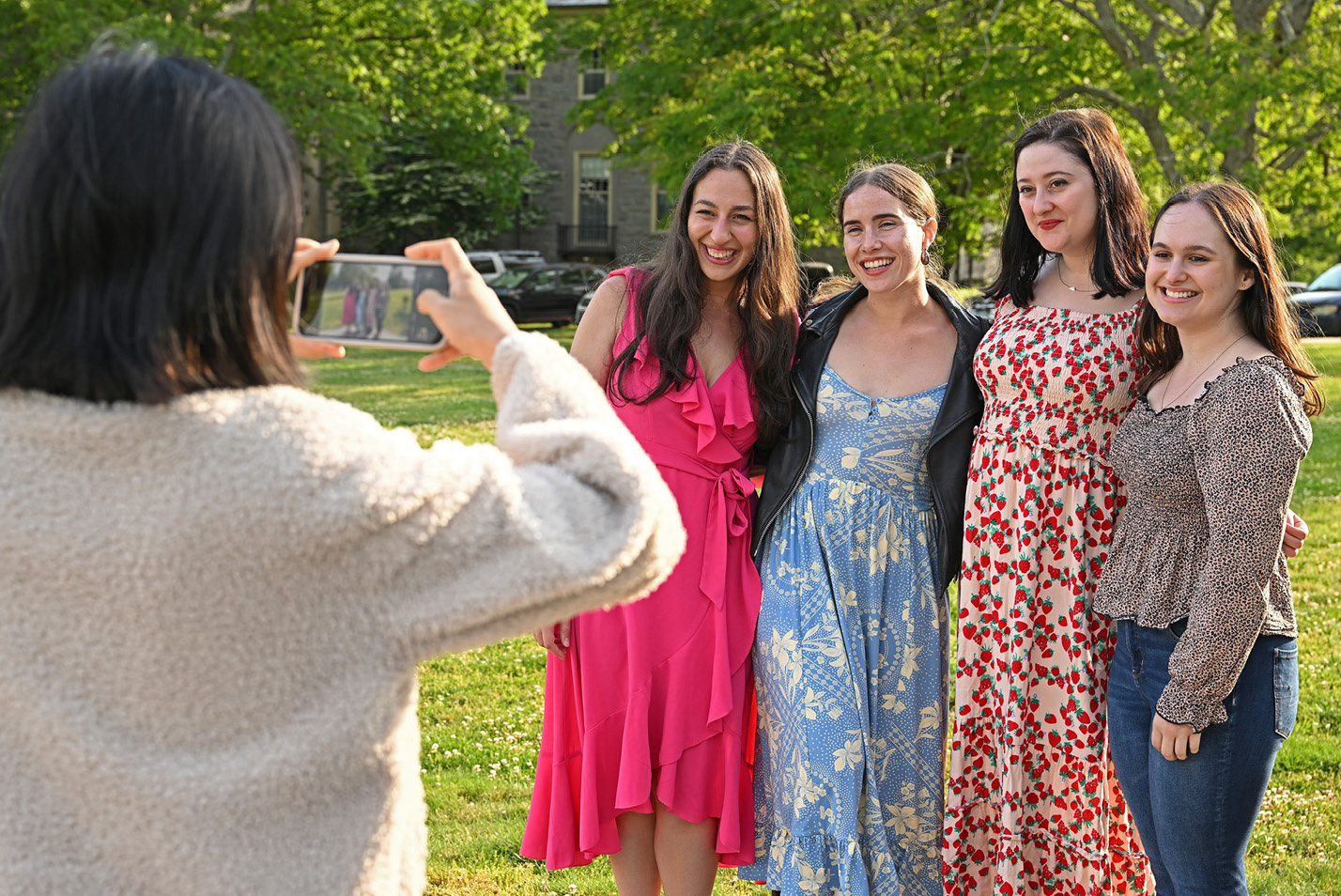 A group of alumns take a photo during Reunion.