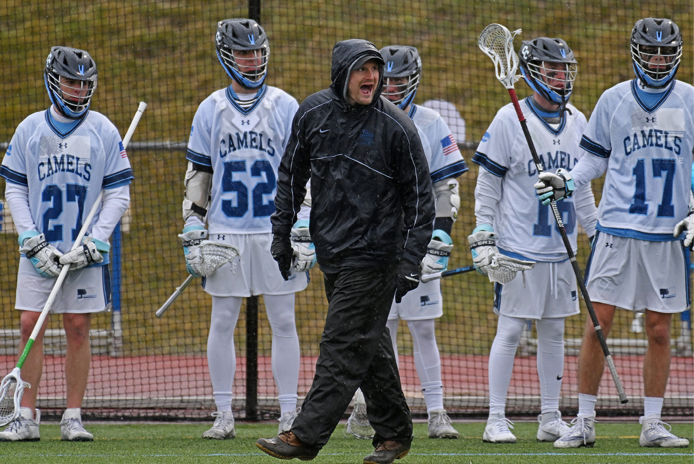 Connecticut College Assistant Men's Lacrosse Coach Dan Thomas shouts encouragement to the team.