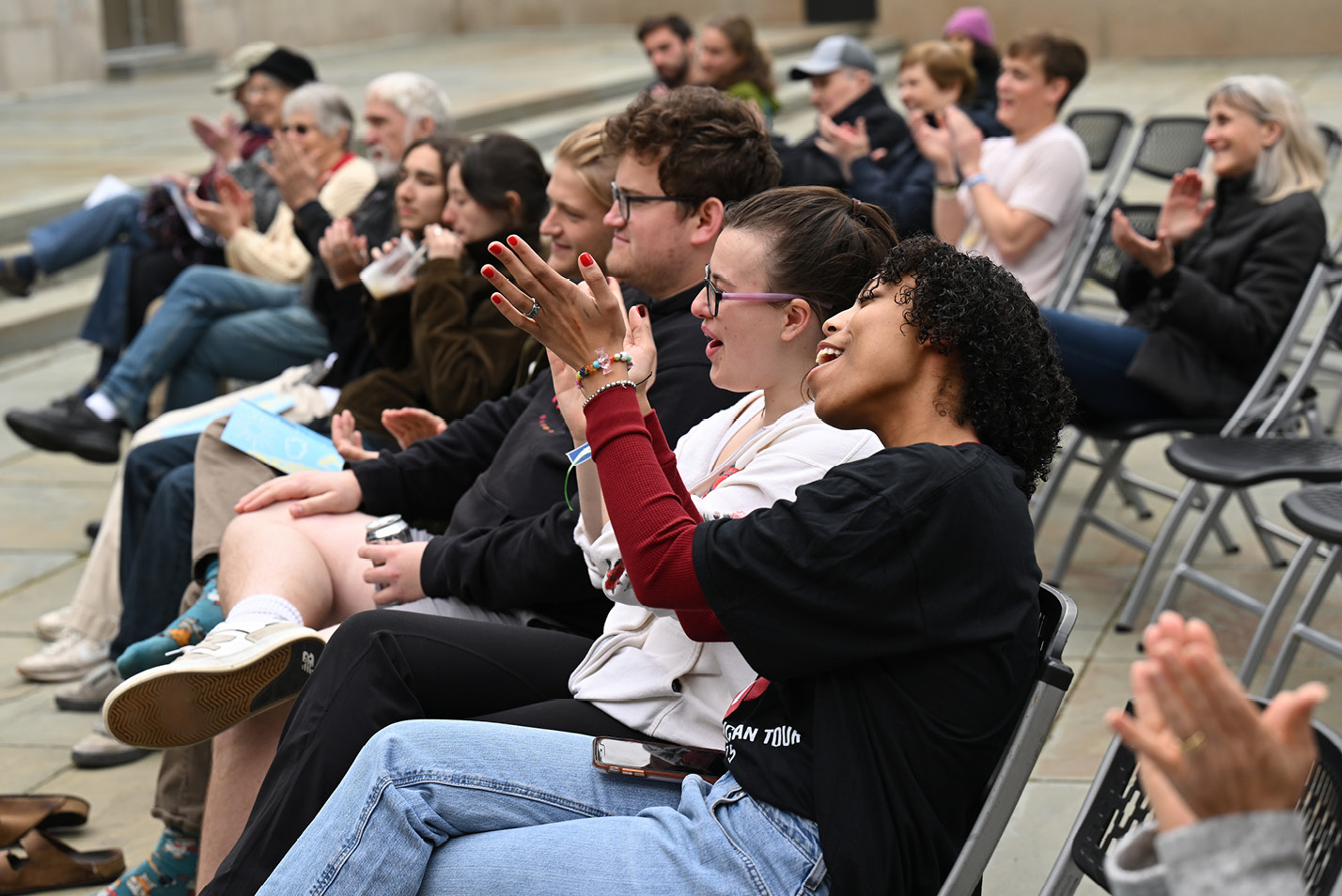 students cheer for a jazz concert in Castle Court