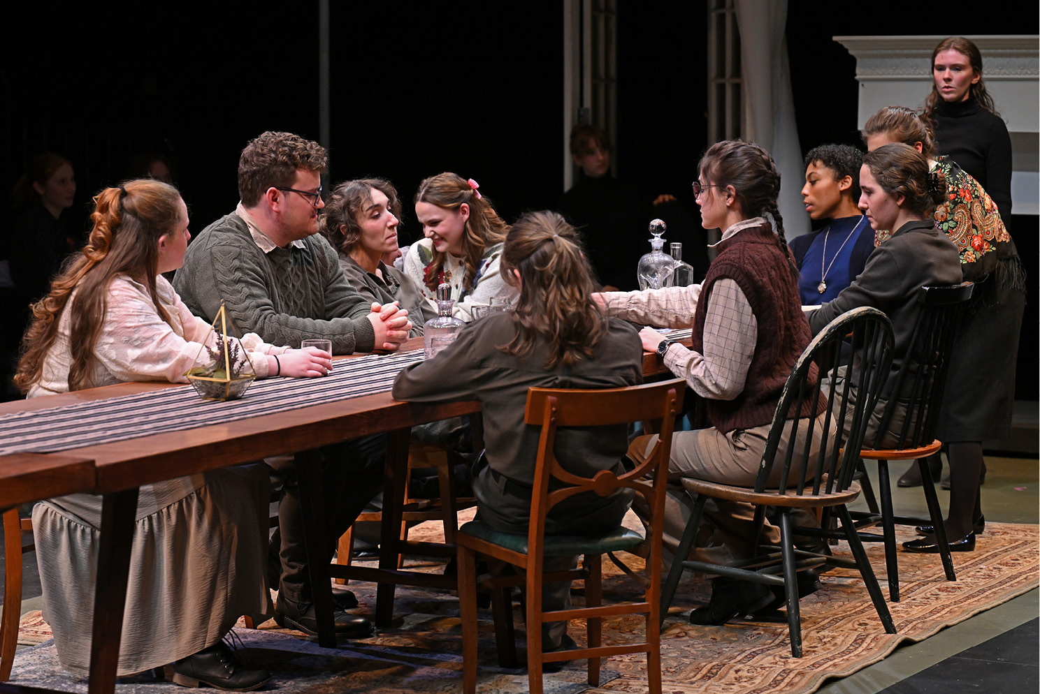 Actors around a dinner table