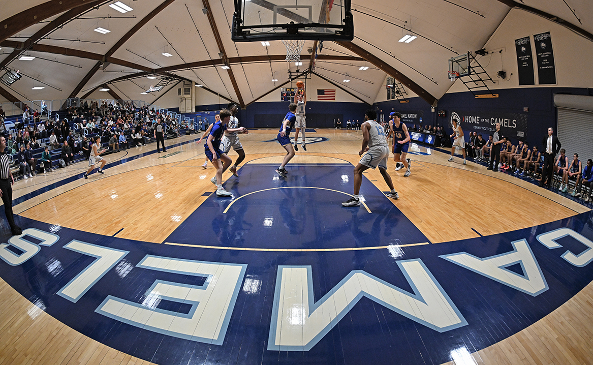 A player takes a shot in this wide angle photo