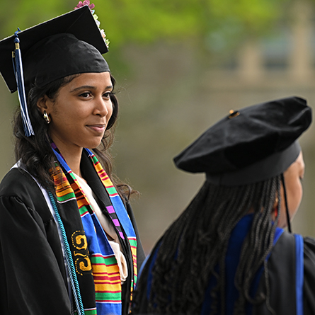 Jasity Mena ’24 looks on as Dean of the College Erika Smith awards her the 2024 Anna Lord Strauss Medal.